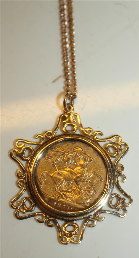 Victorian sovereign in frame on gold chain